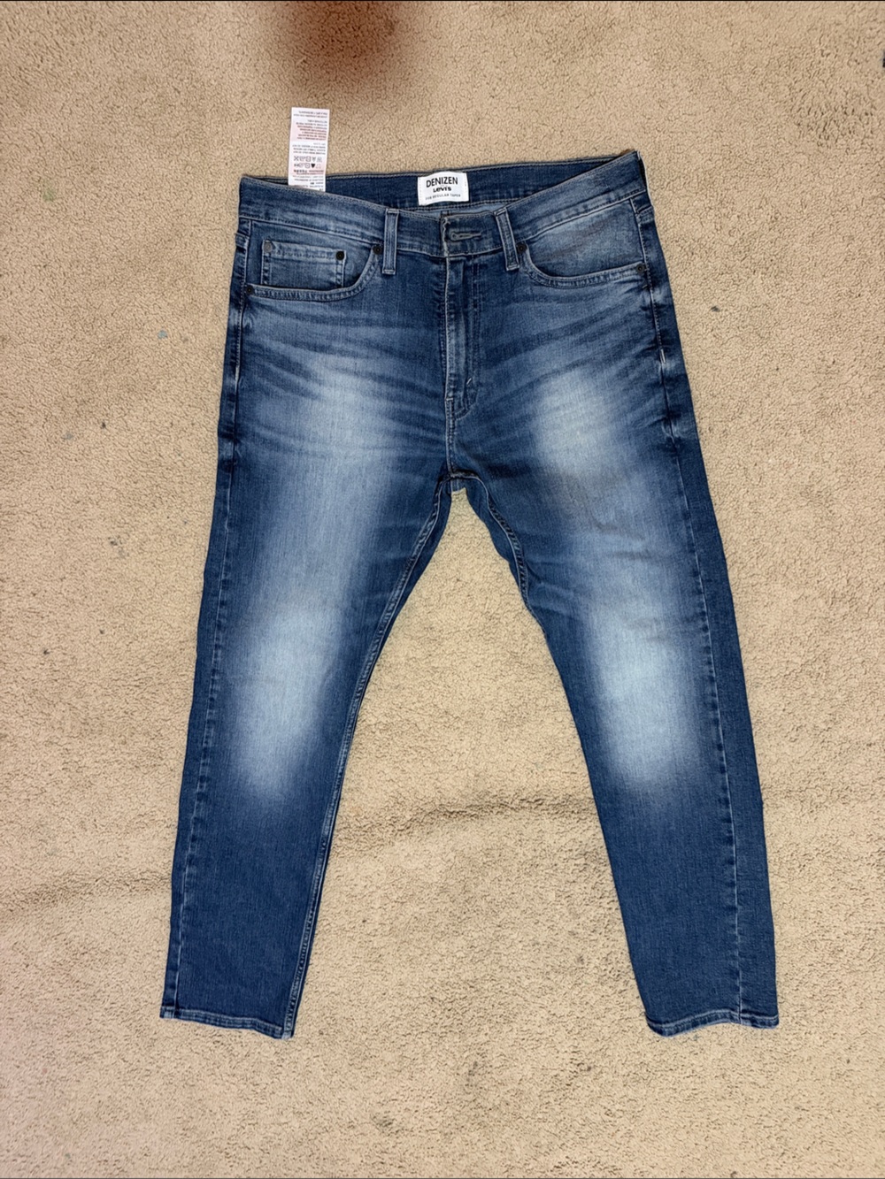 Denizen from Levi's Men's Medium Blue Skinny Jeans with Faded Highlights